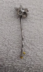 antique silver-toned floral hairpin with a crystal center
