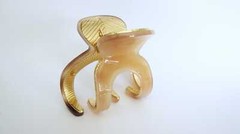 Medium brown beige gold tone textured acrylic and metal hair claw clip