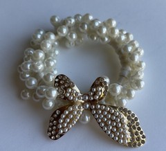 pearl and rhinestone bow hair tie or bracelet.