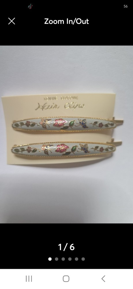 These Genuine Cloisonné Barrettes Feature A Delicate Floral Design a gold-tone
