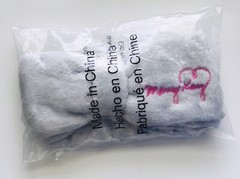 New In Package Mary Kay Light Gray Big Bow Headband with Pink Embroidered Logo