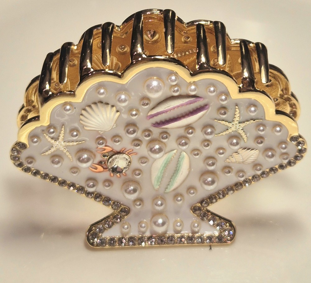 Gold seashell hair clip with rhinestones & pearls, beach-style metal clip.