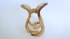 Medium brown beige gold tone textured acrylic and metal hair claw clip