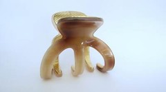 Medium brown beige gold tone textured acrylic and metal hair claw clip