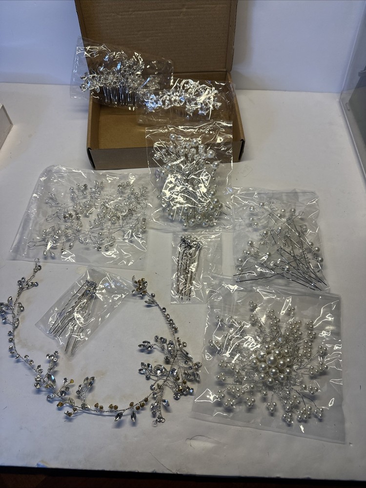 35 Piece Silver tone Pearl And Rhinestone Bridal Hair Accessories, New In box.