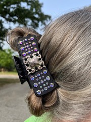 Hair Clip with leather, conchos , black and clear crystal. Concho is silver.