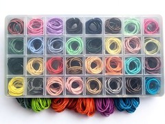 32 Pieces of Poney Tail Hair Ties. Multi Colors New In Package