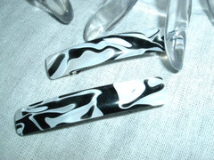 VINTAGE PAIR CONAIR BLACK AND WHITE MARBLED LLUCITE HAIR BARRETTES