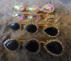 Gold Tone alligator hair clips feature teardrop-shaped rhinestones