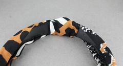 Brown Black White turban knot head band fabric covered grip teeth animal print