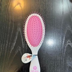 Cricket Splash Pink hair brush with white handle