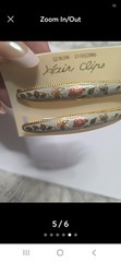These Genuine Cloisonné Barrettes Feature A Delicate Floral Design a gold-tone