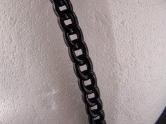 Black thin skinny plastic chain link headband hair band accessory grip teeth